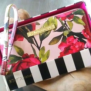 NWT BEAUTIFUL BETSEY JOHNSON FLORAL PRINT WRISTLET. STILL IN ORIGINAL BOX.